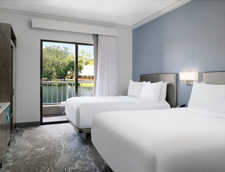 Two double beds looking out over the water