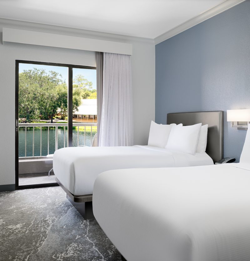 Two double beds looking out over the water